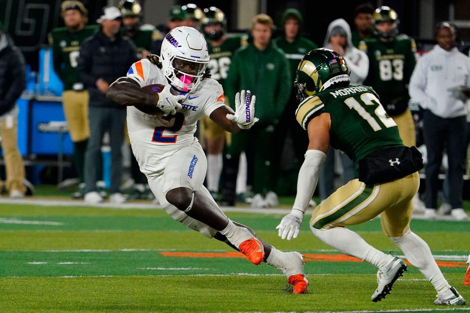 Oct 14, 2023; Fort Collins, Colorado, USA; Boise State Broncos running back Ashton Jeanty (2) tried to avoid Colorado State Rams defensive back Dominic Morris (12) at Sonny Lubick Field at Canvas Stadium. Mandatory Credit: Michael Madrid-USA TODAY Sports